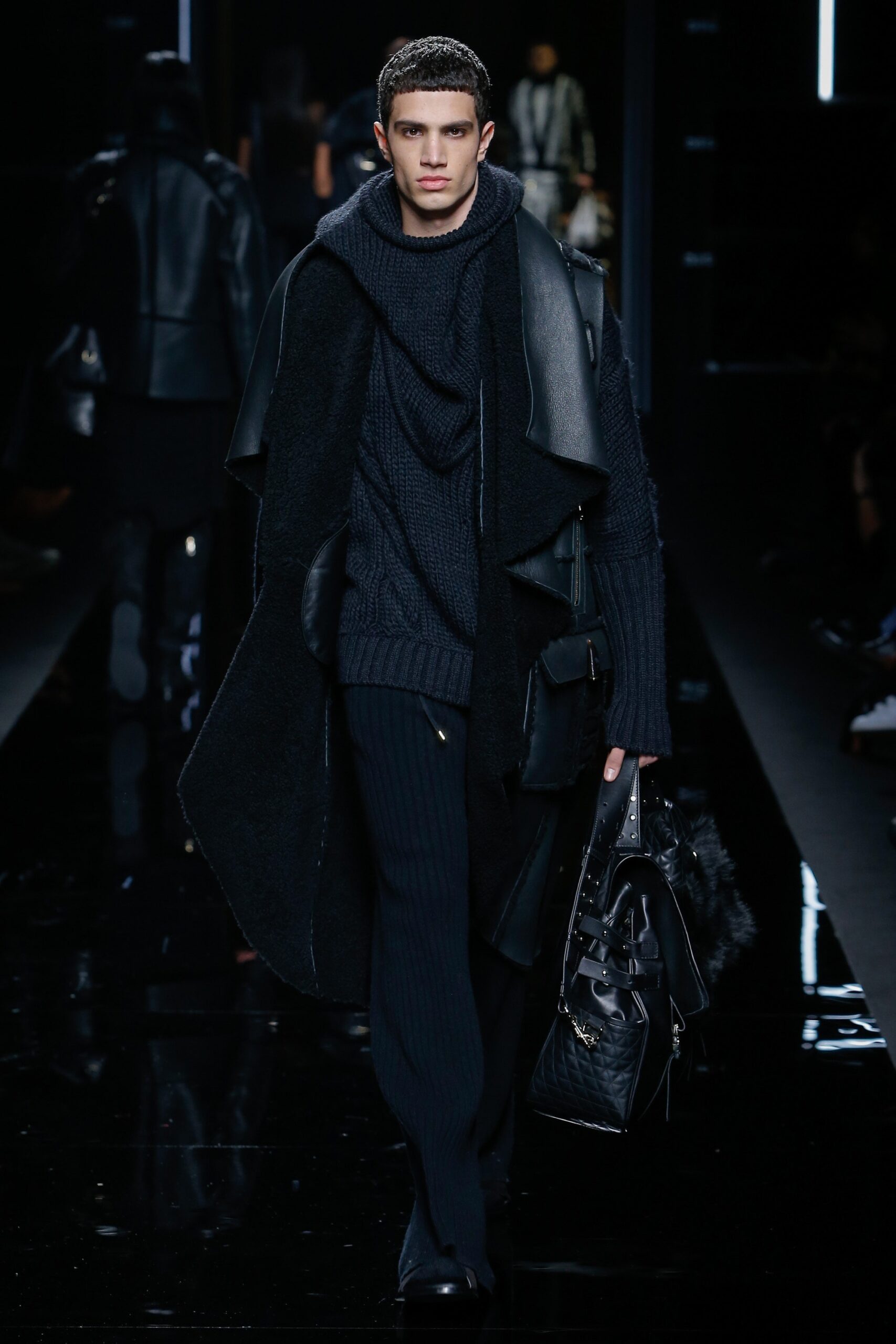 black wool coat with navy sweater