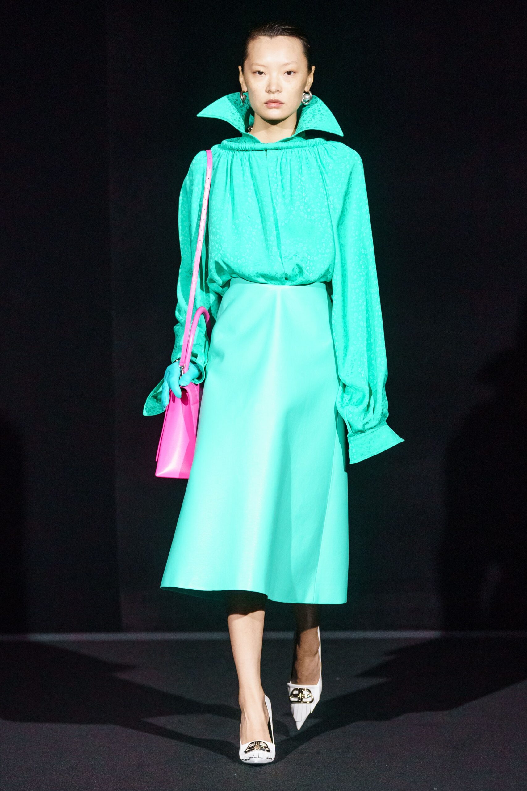 green silk blouse with blue midi skirt