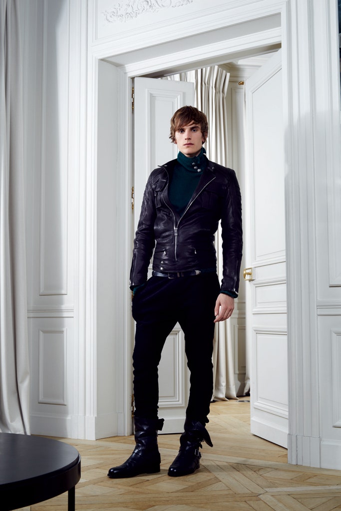 black leather jacket with green top