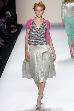 fitted printed top with pleated skirt