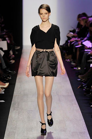 black silk fitted top and mini skirt
