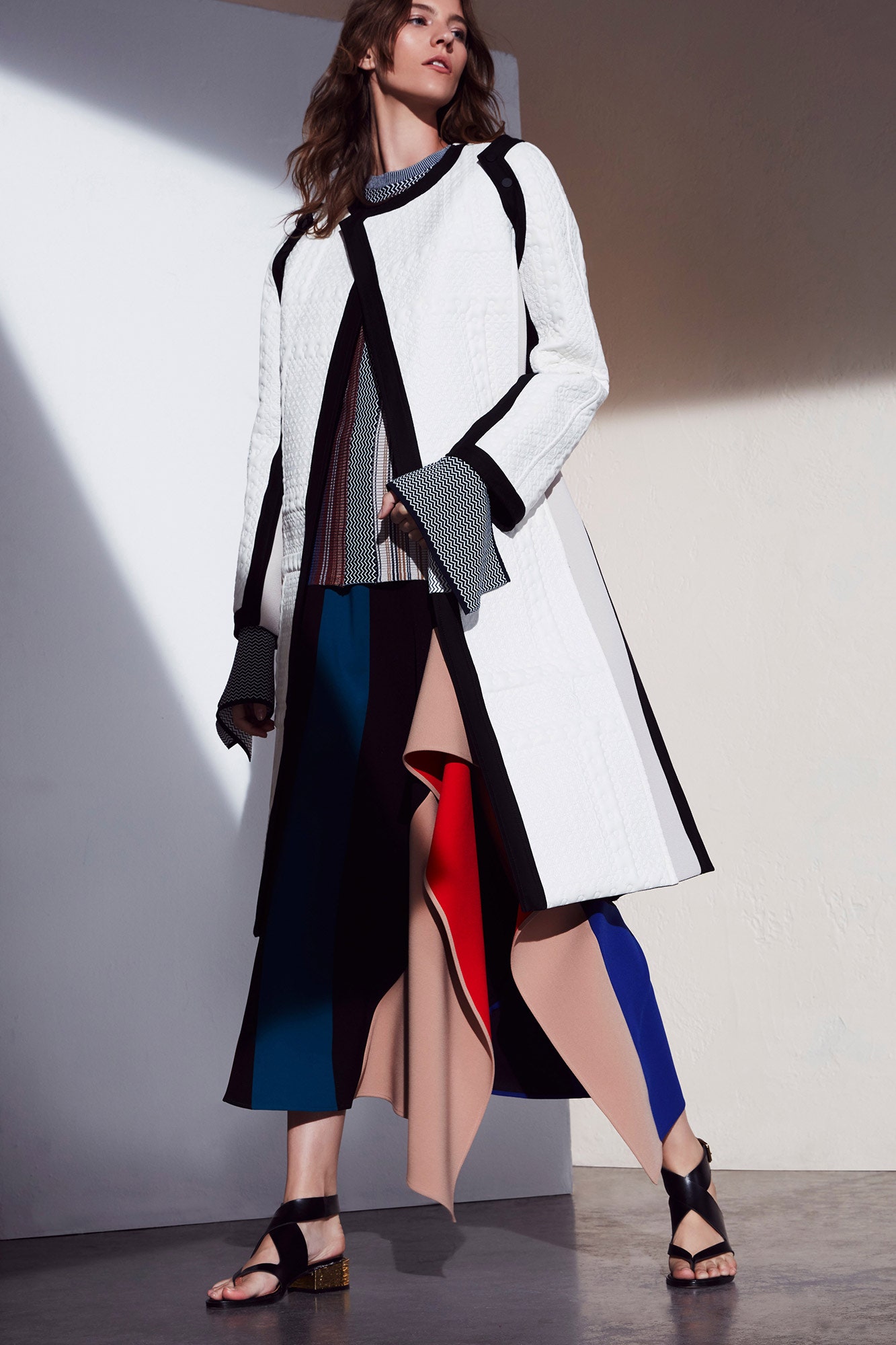 white relaxed coat with striped top