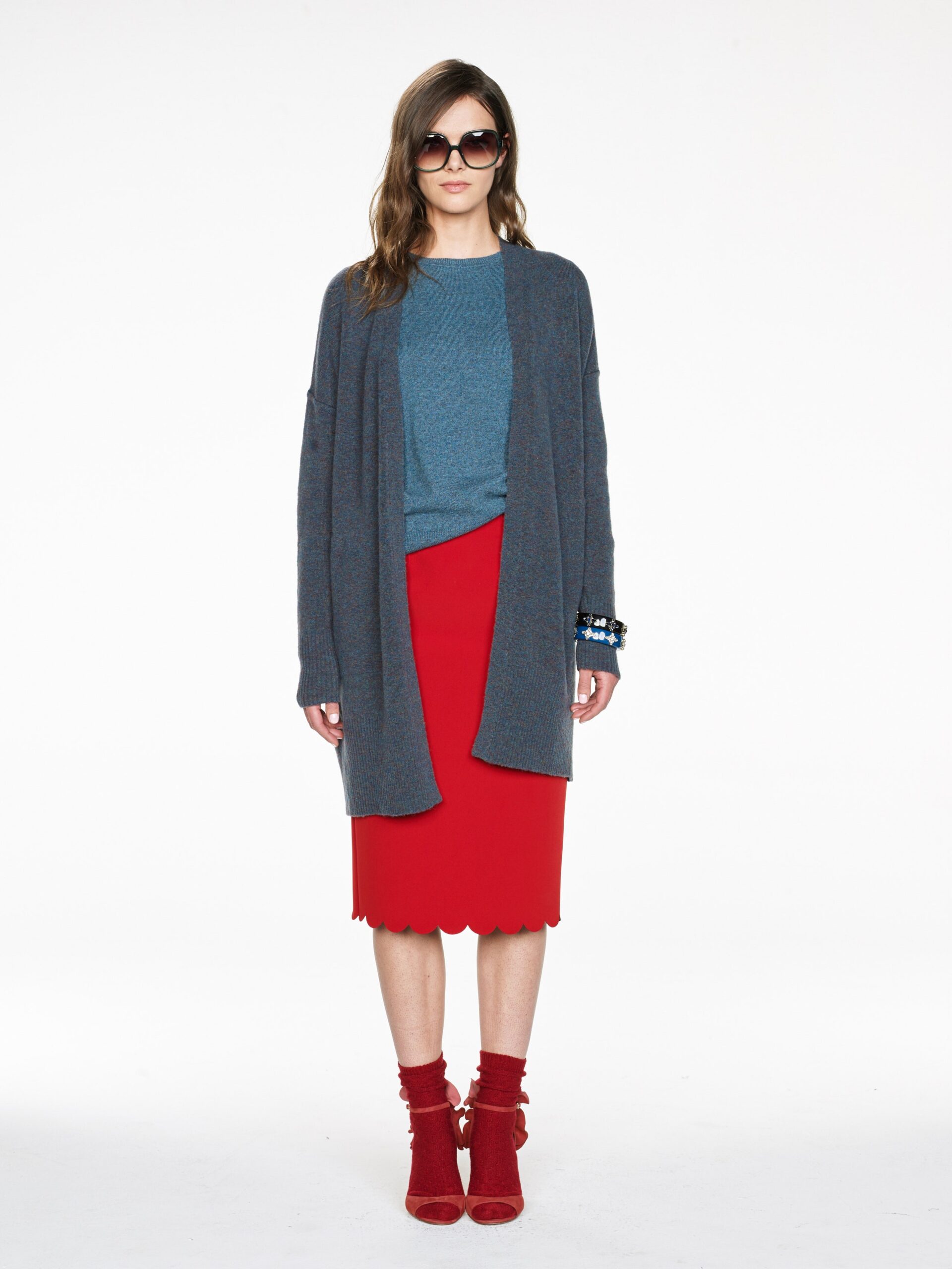 gray cardigan blue top red skirt