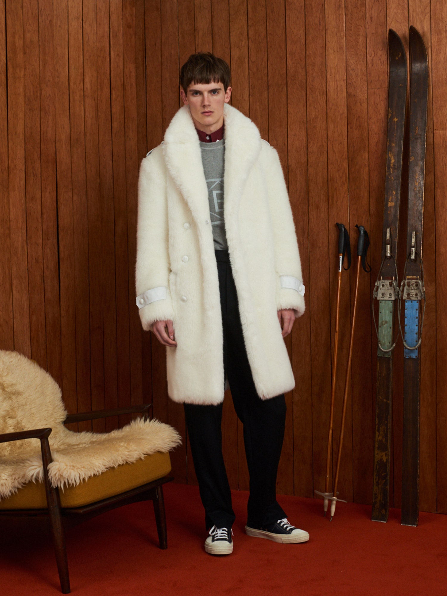 white faux-fur coat with gray sweater