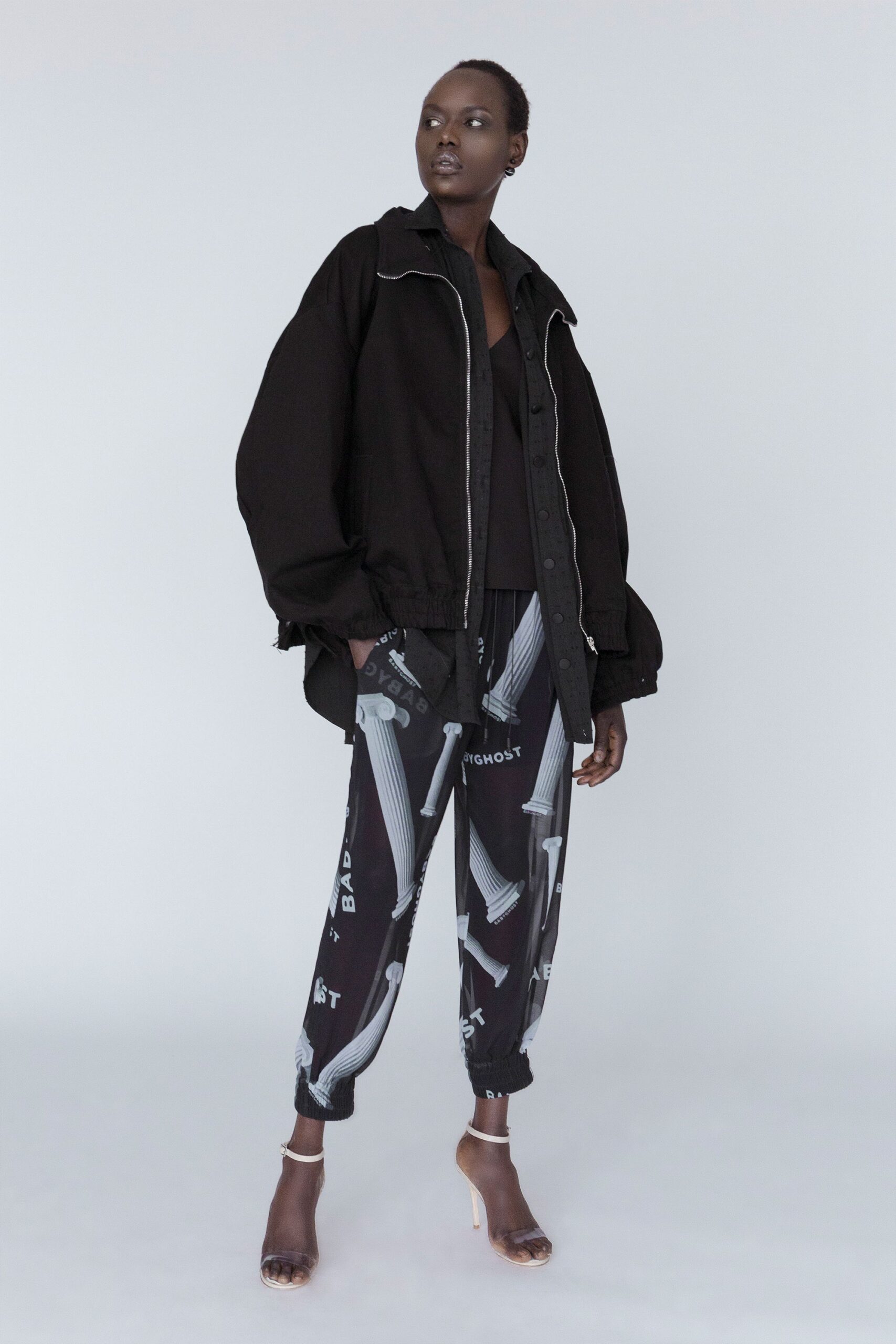 oversized black jacket and printed pants