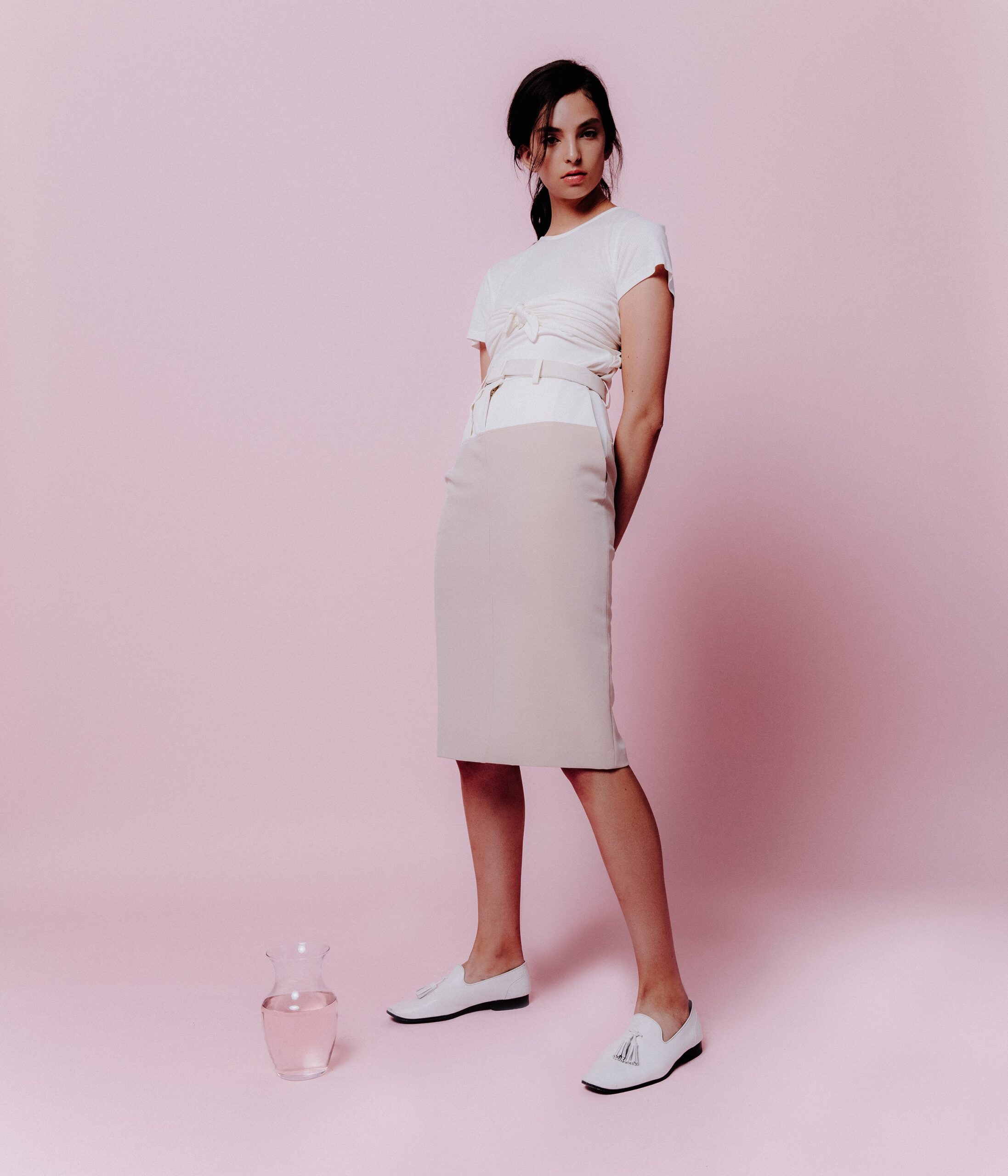 white fitted top and beige pencil skirt