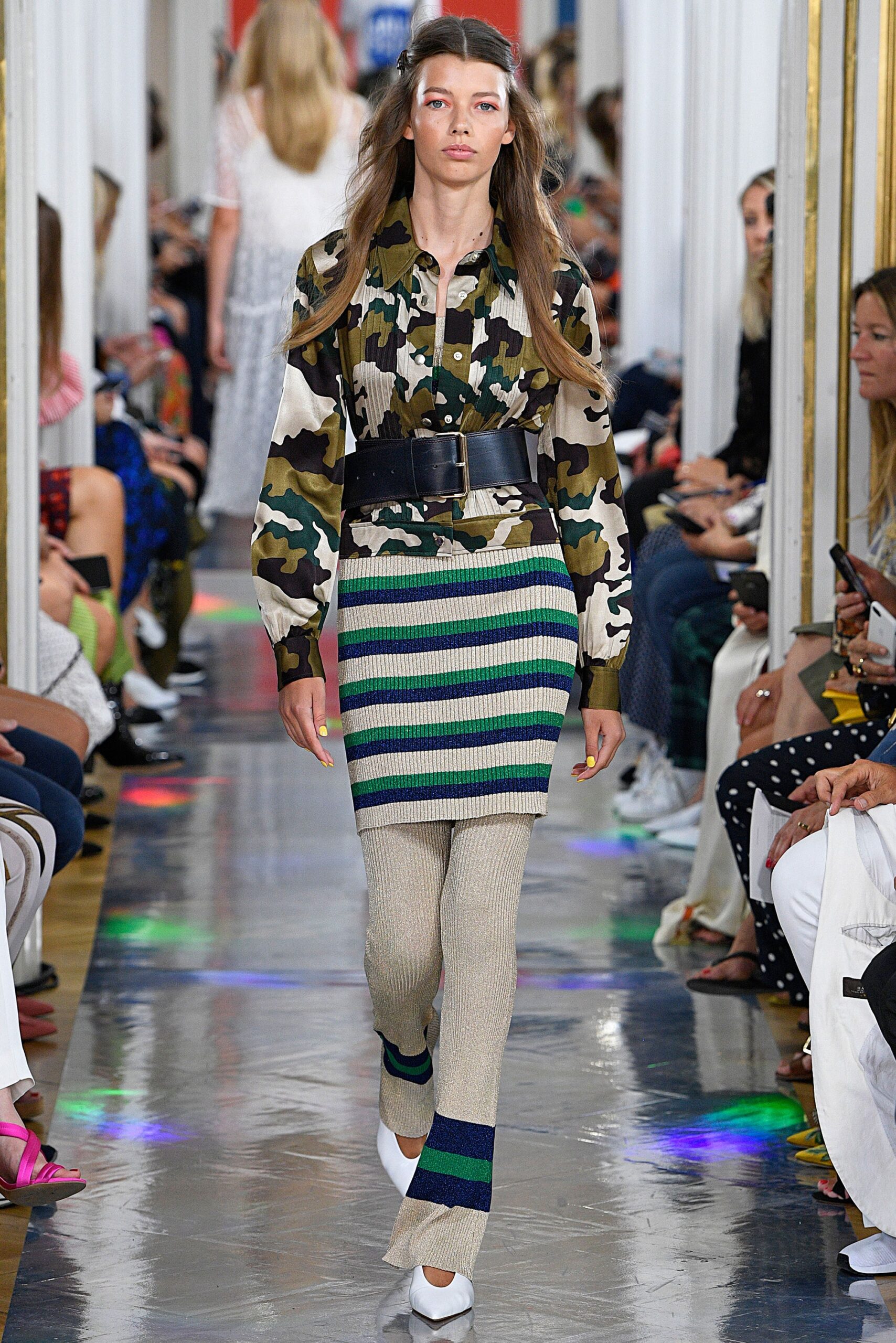 fitted camouflage shirt and striped skirt