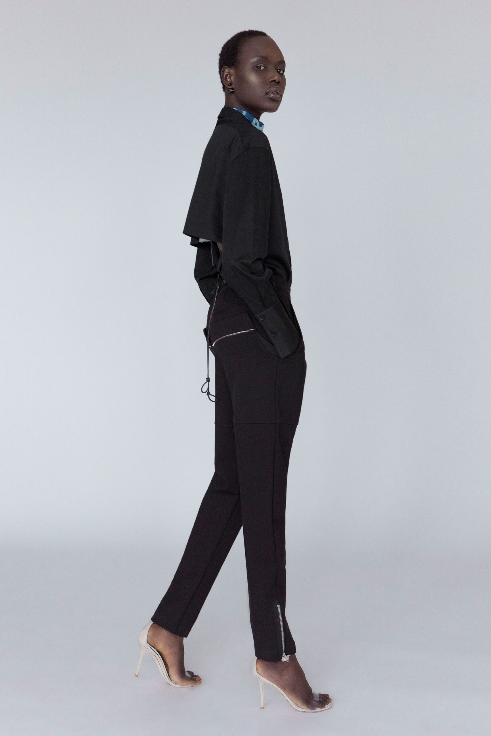 black relaxed shirt with fitted pants