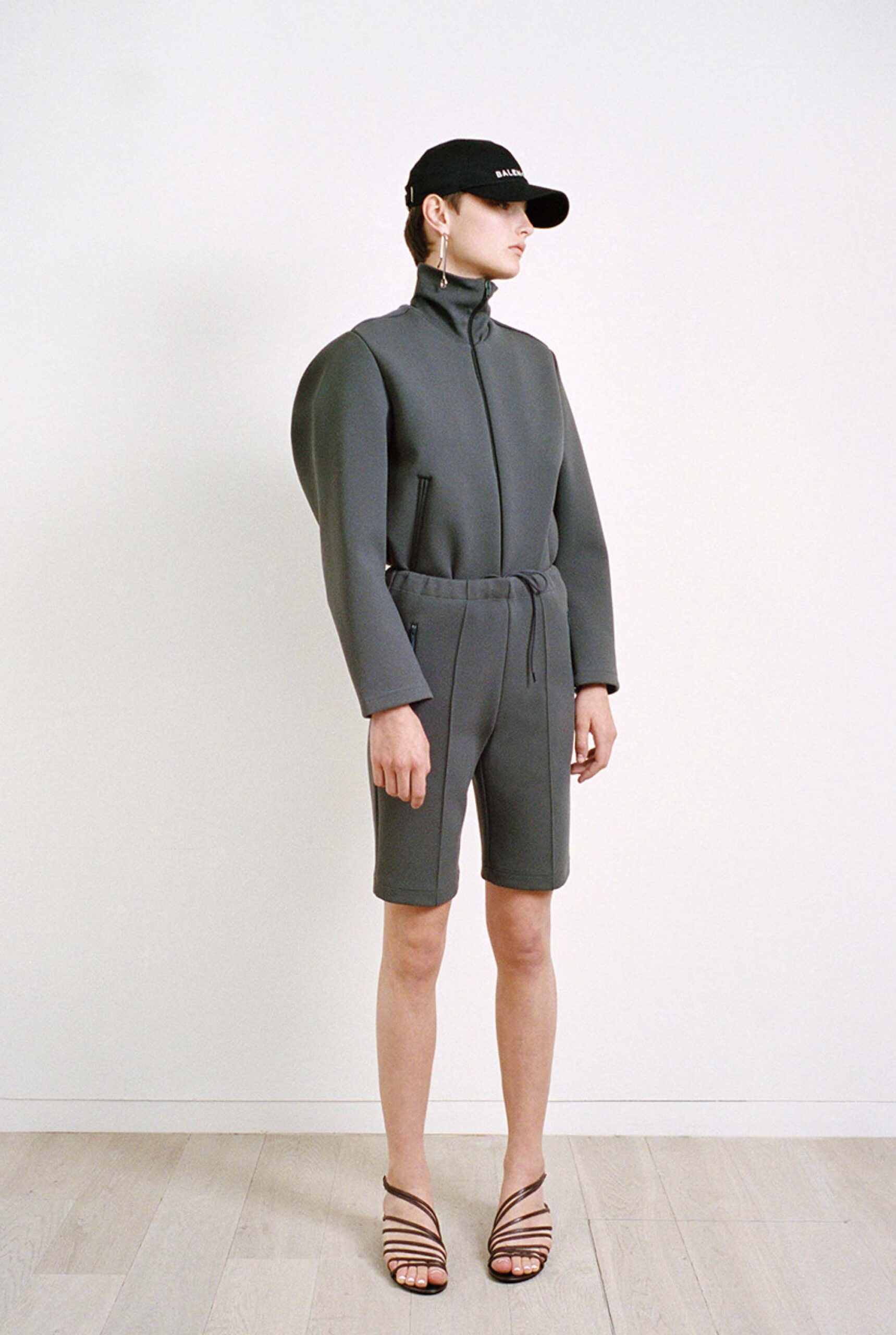 gray neoprene long-sleeve collared fitted structured zippered jumpsuit