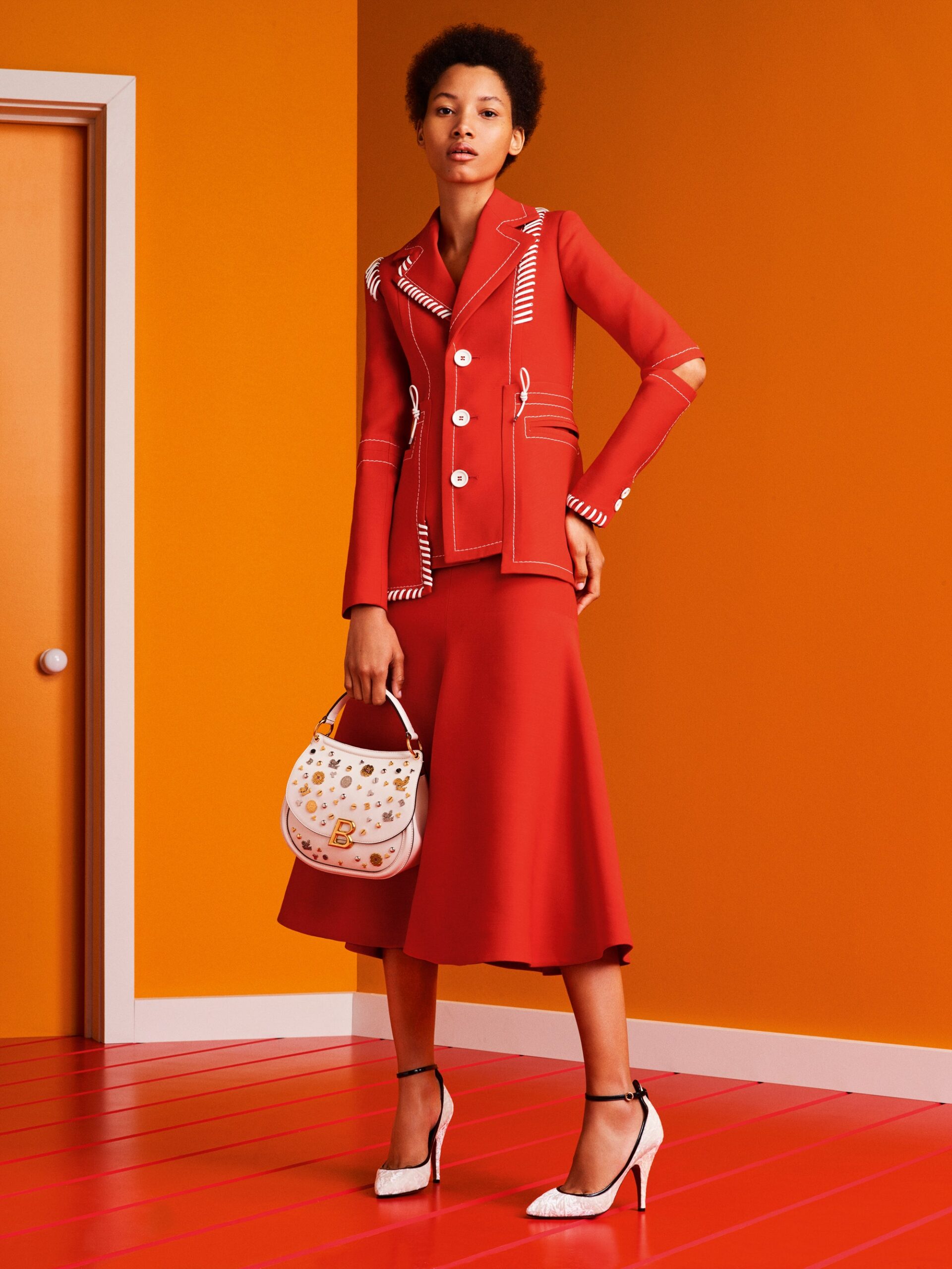 red neoprene blazer and skirt