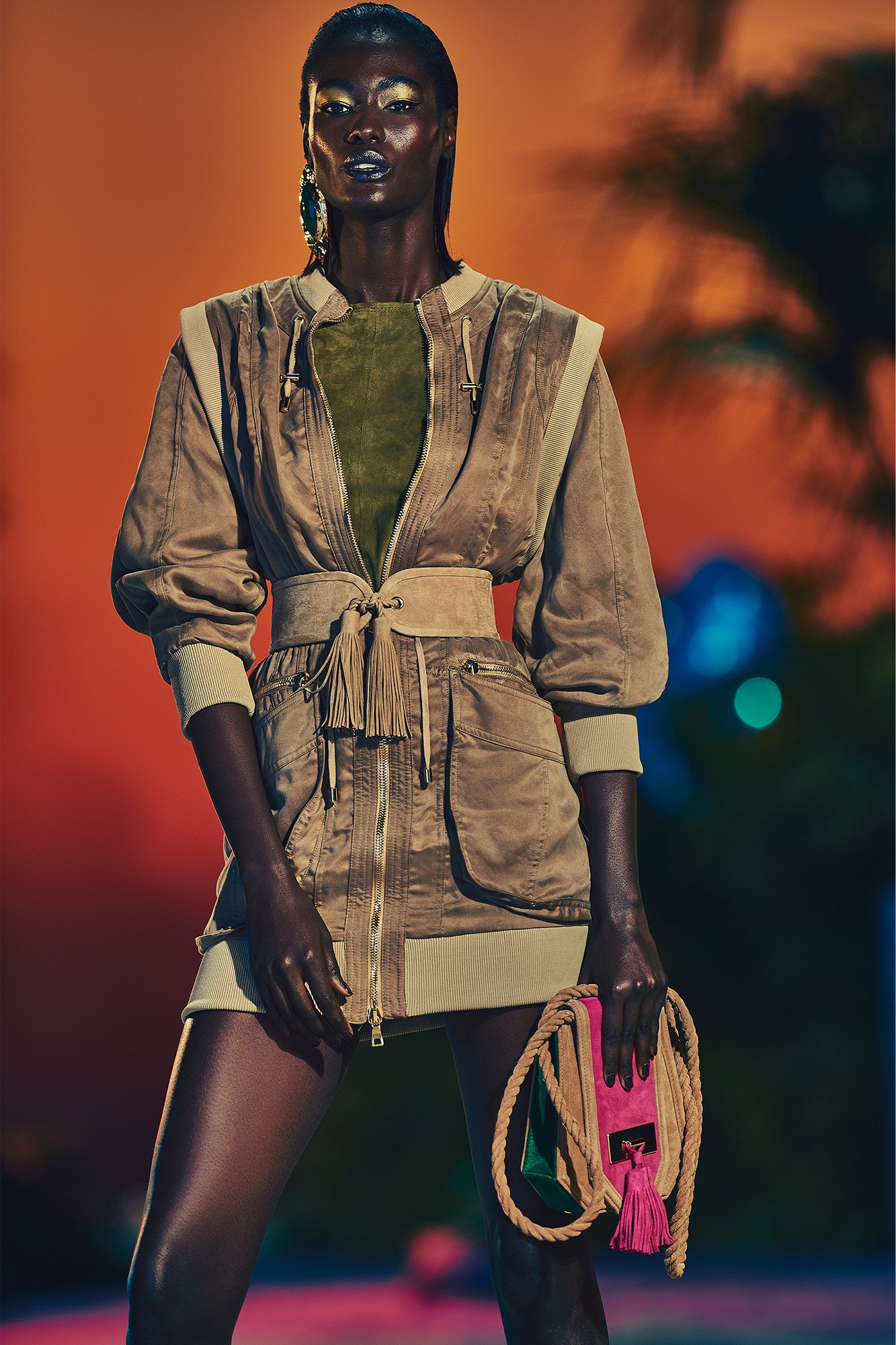 beige fitted jacket with green dress