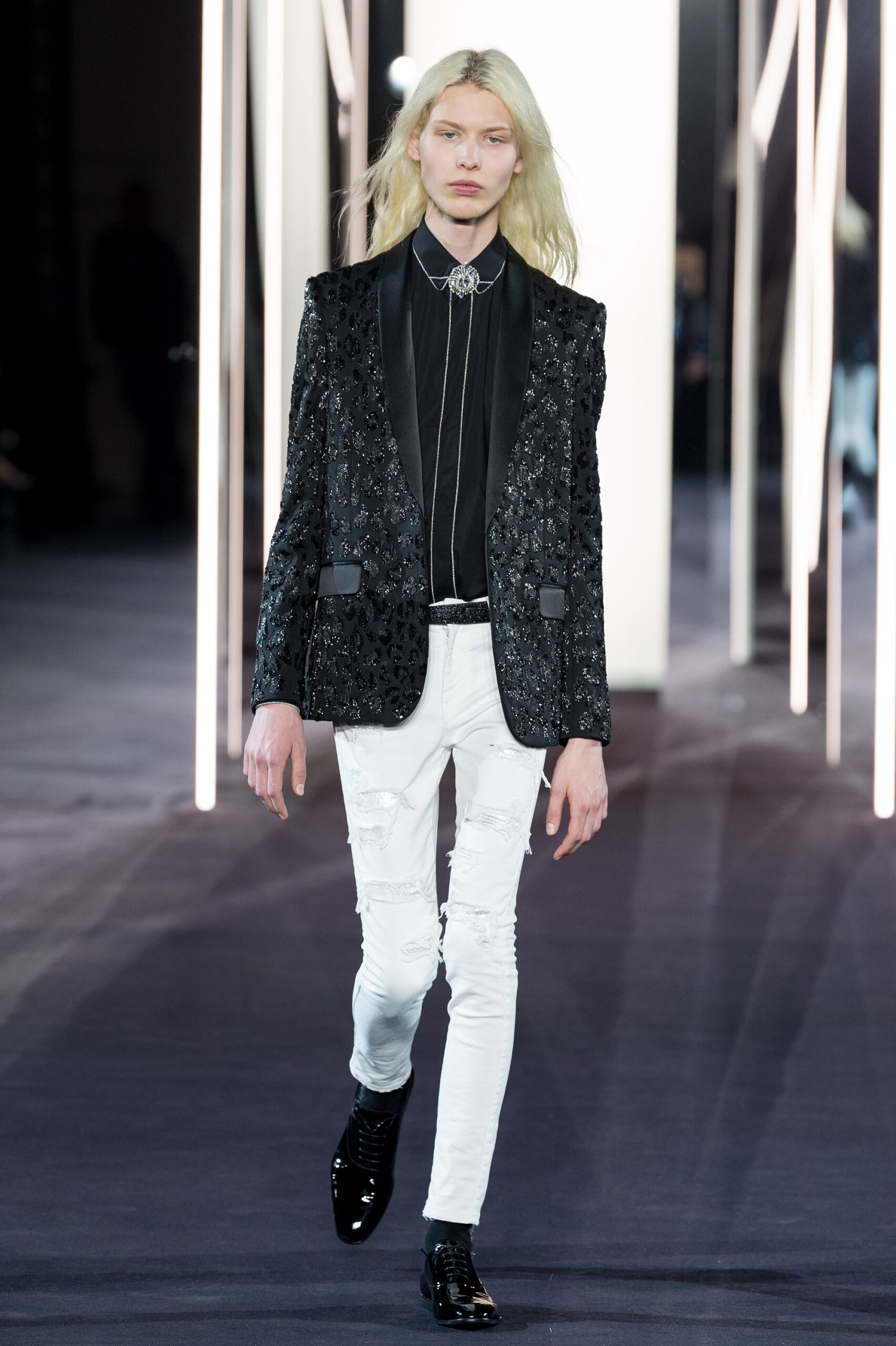 black embroidered blazer with white pants