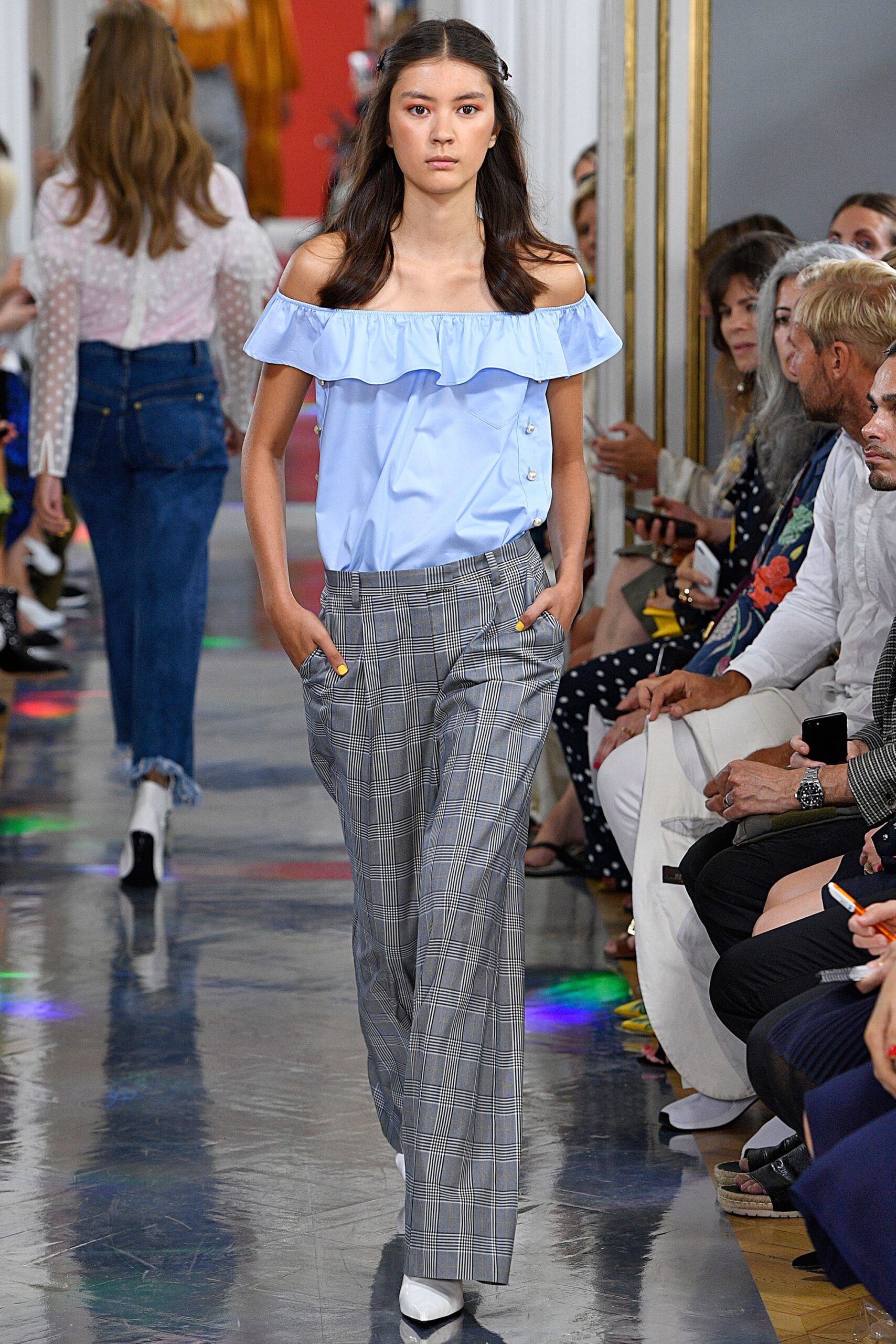 blue off-shoulder top with gray pants