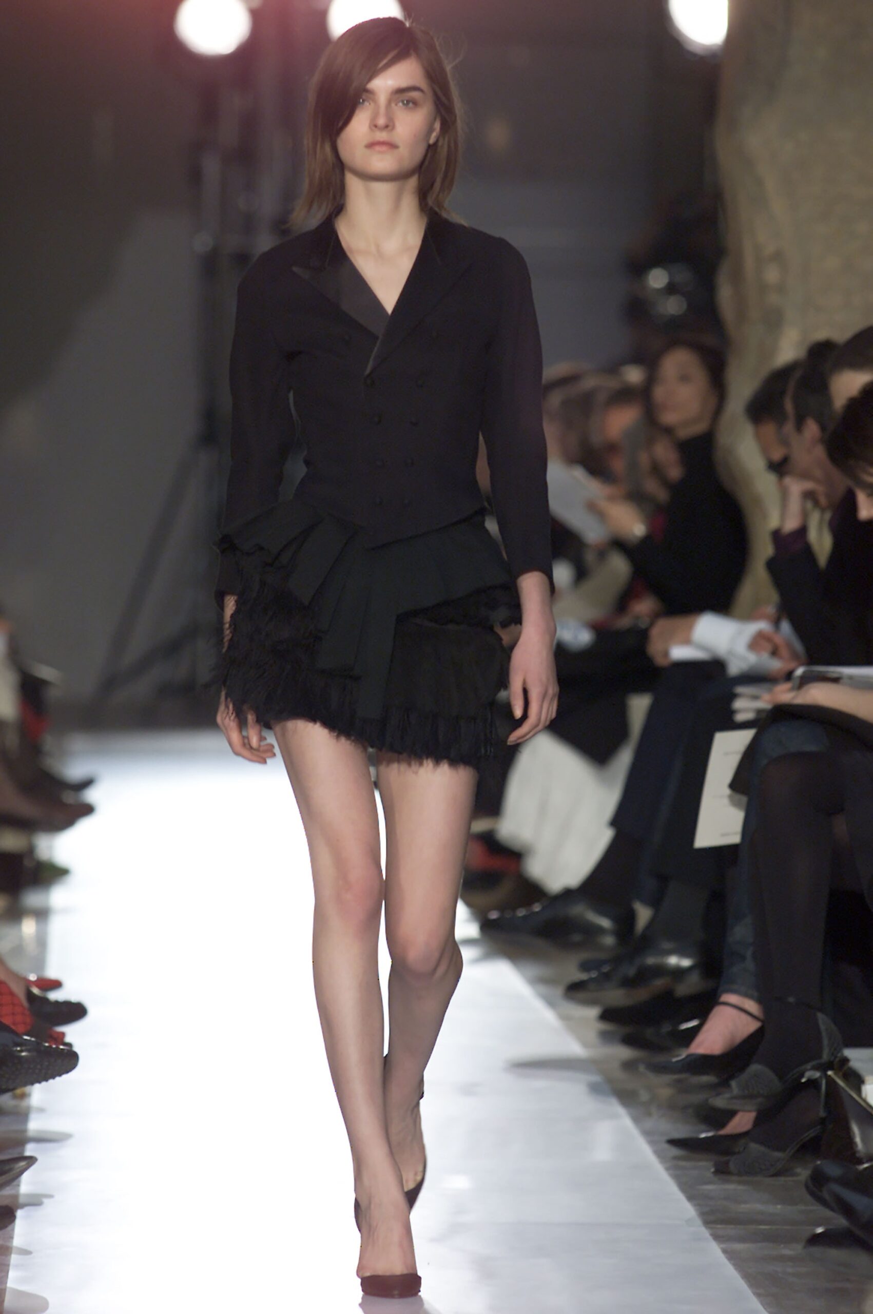 black fitted blazer and mini skirt