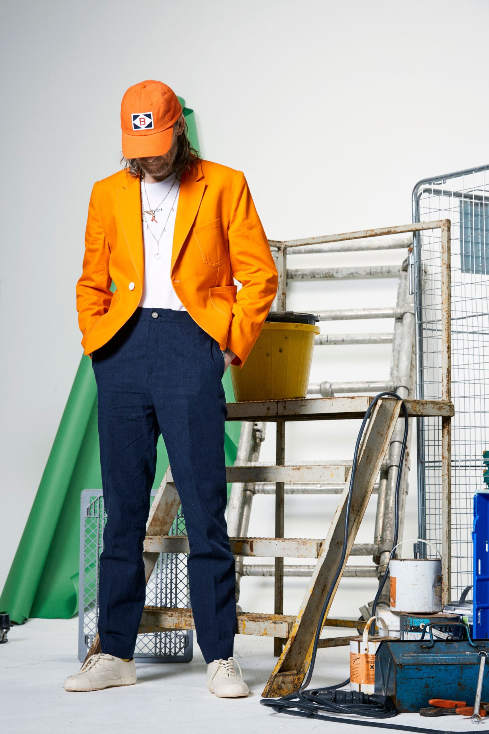 orange blazer with navy pants