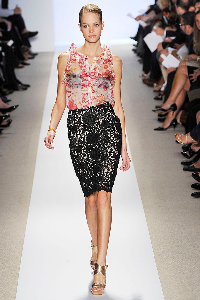 pink ruffled blouse black lace skirt