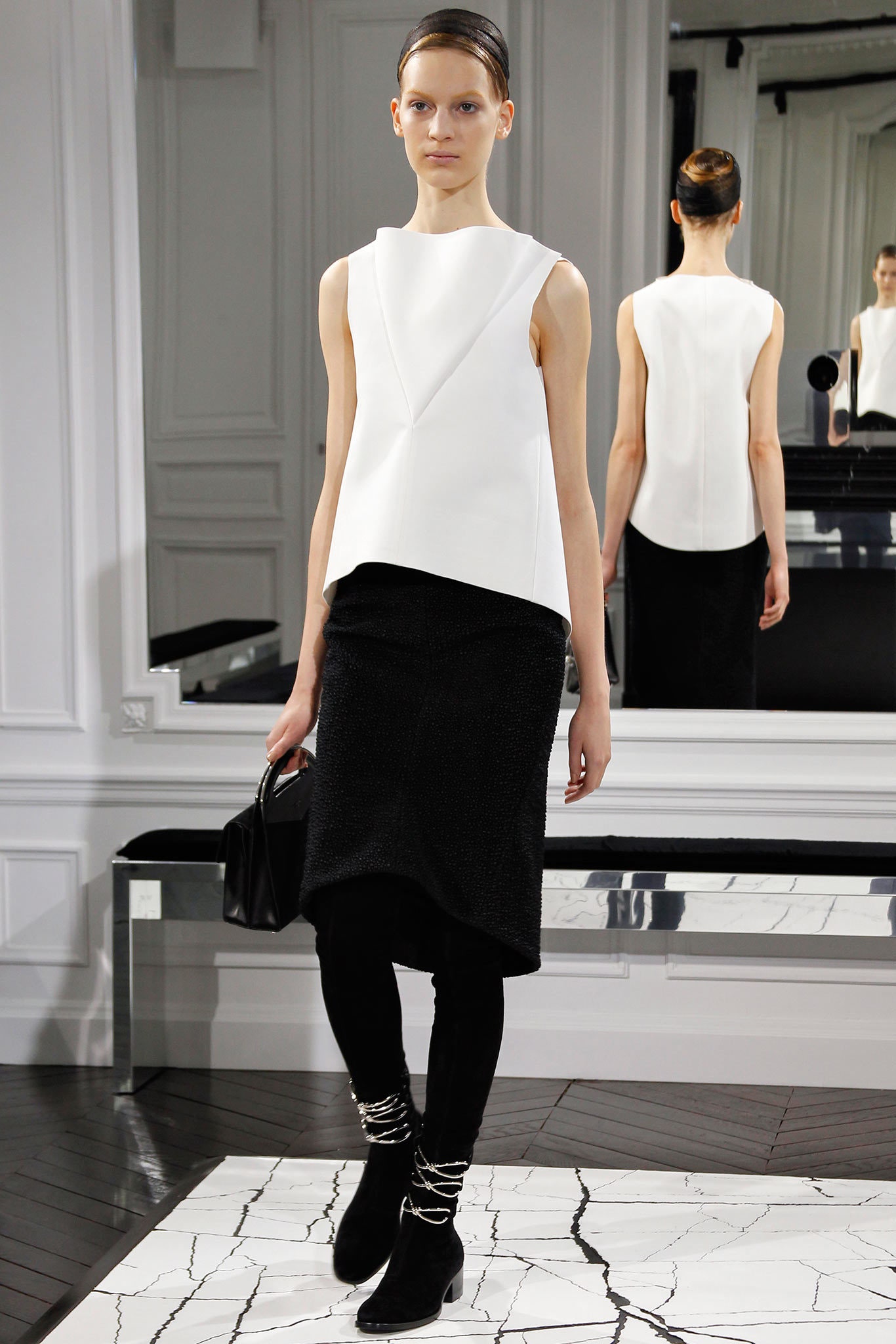 white fitted top with black skirt