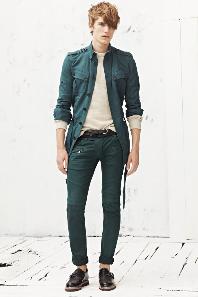 teal jacket beige sweater green pants