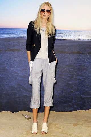 black blazer gray top light blue pants