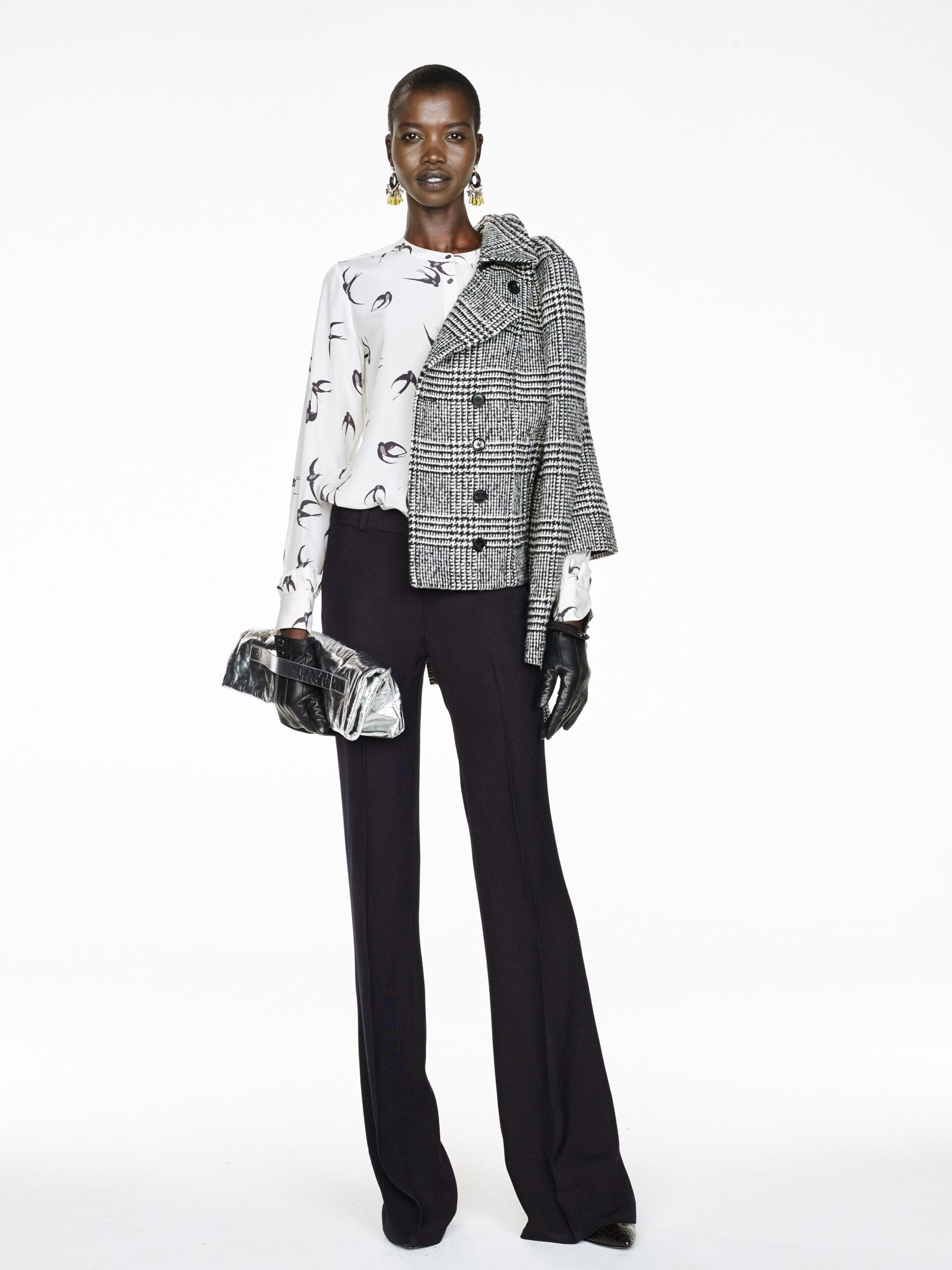 white printed blouse gray jacket black pants