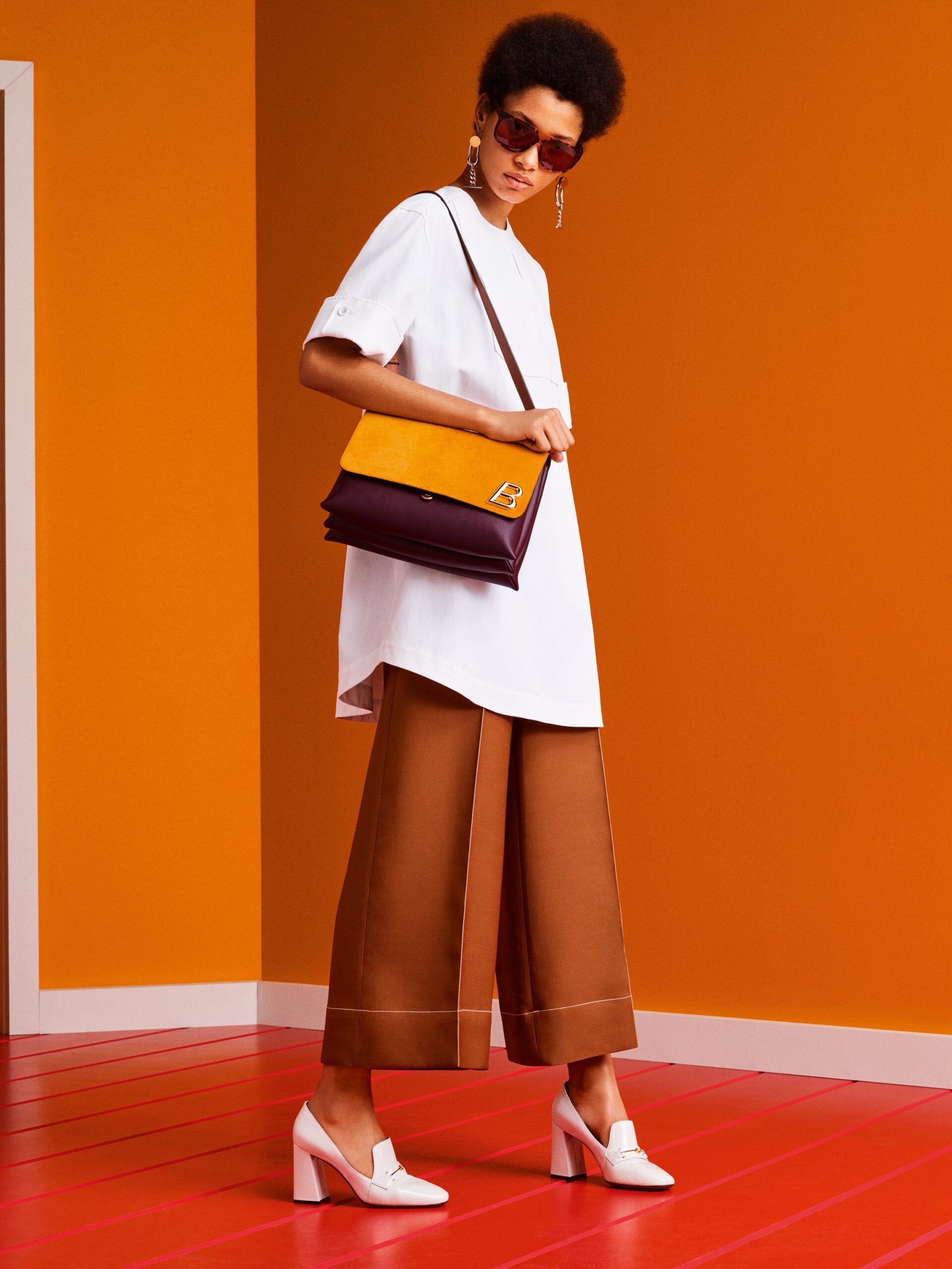 white relaxed top with brown wide-leg pants