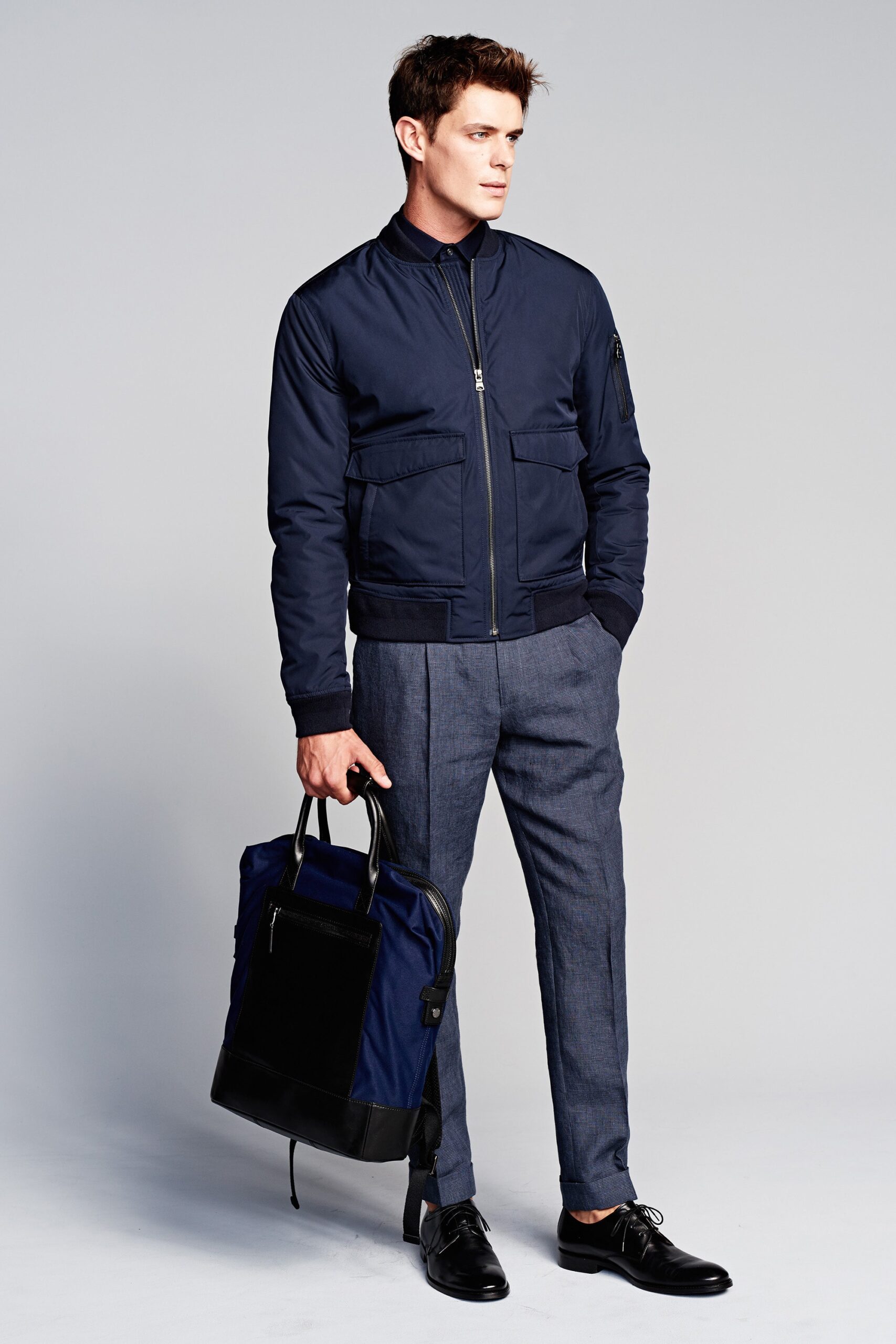 blue fitted jacket with gray pants