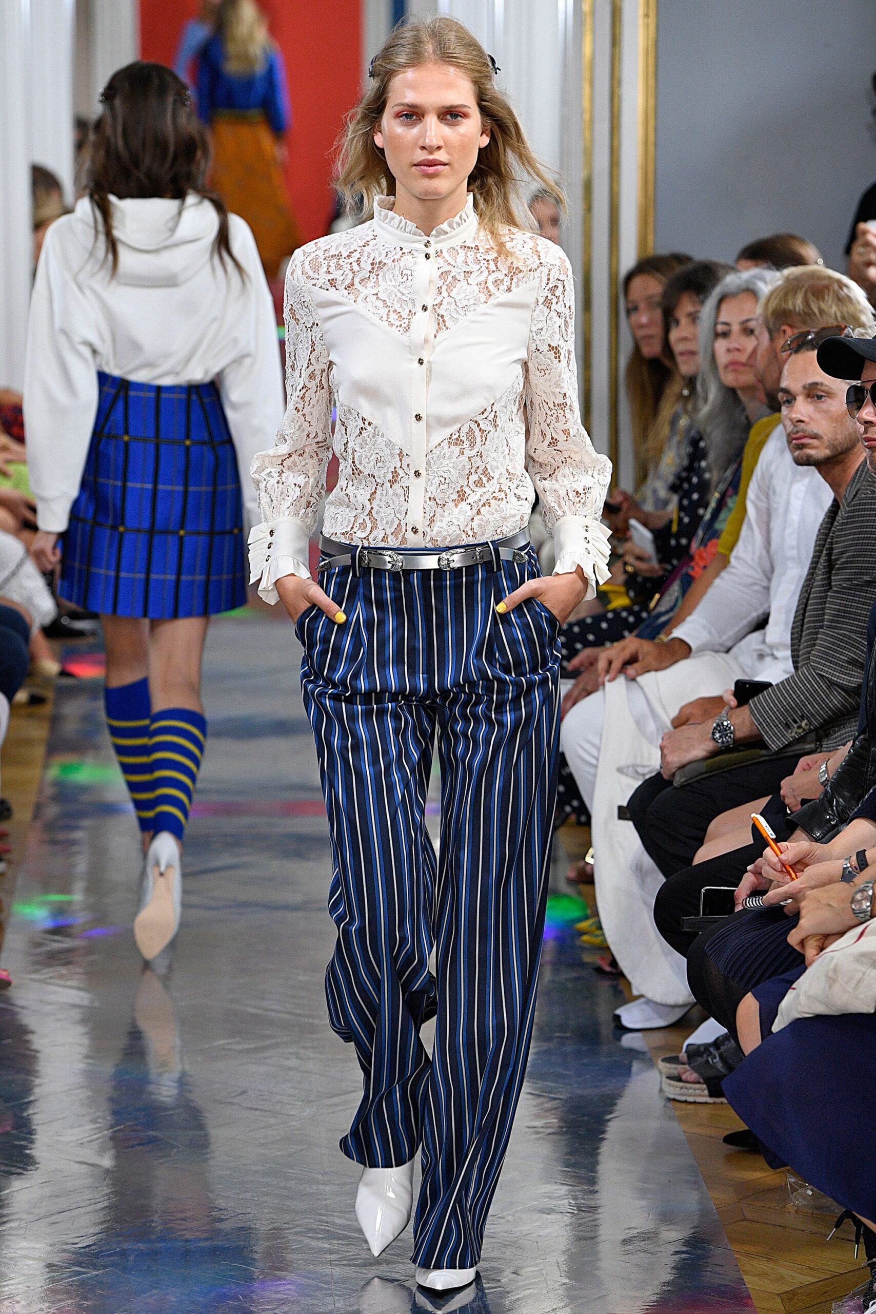 white lace blouse with blue striped pants