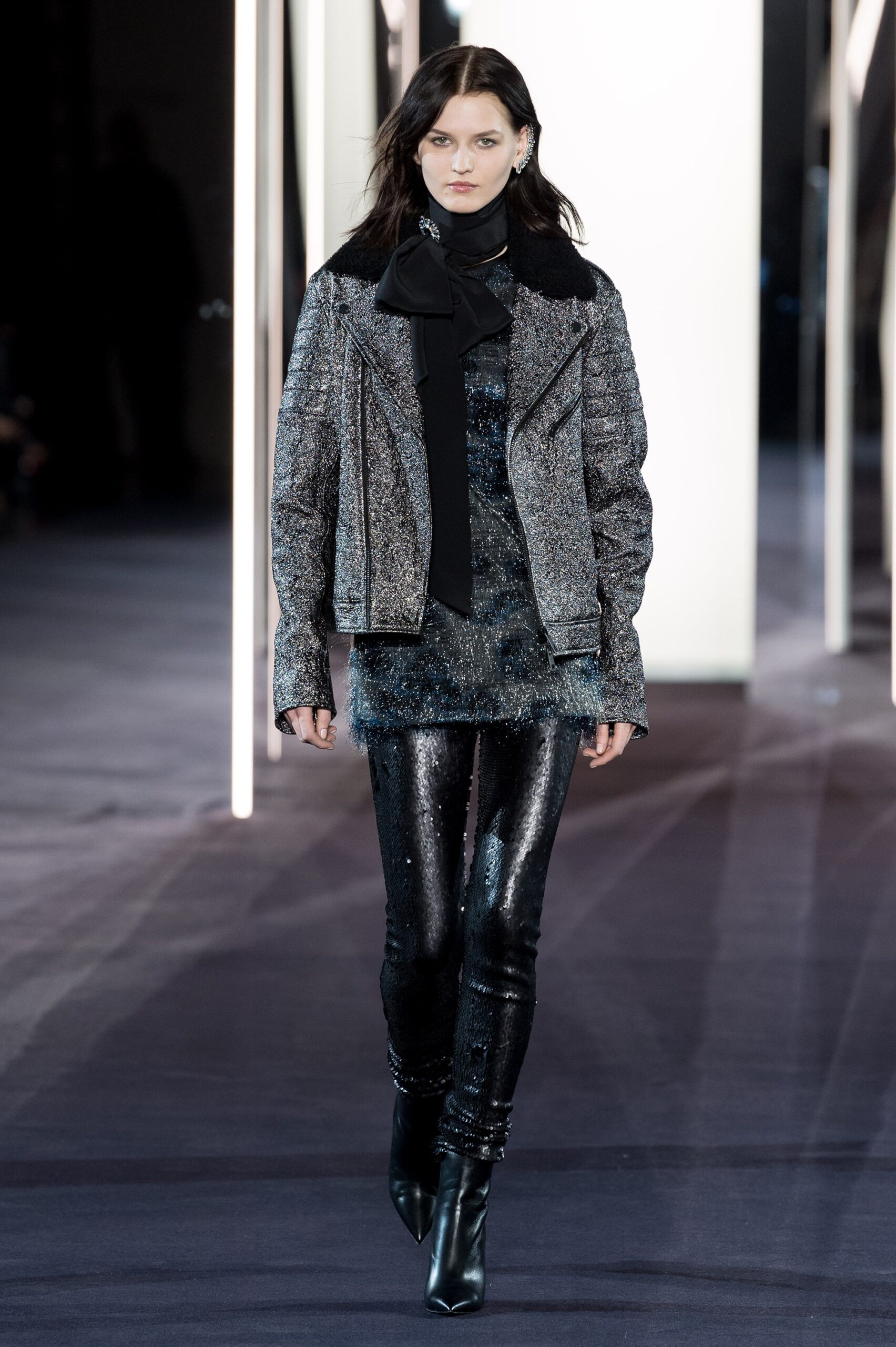 gray metallic fitted jacket with black top