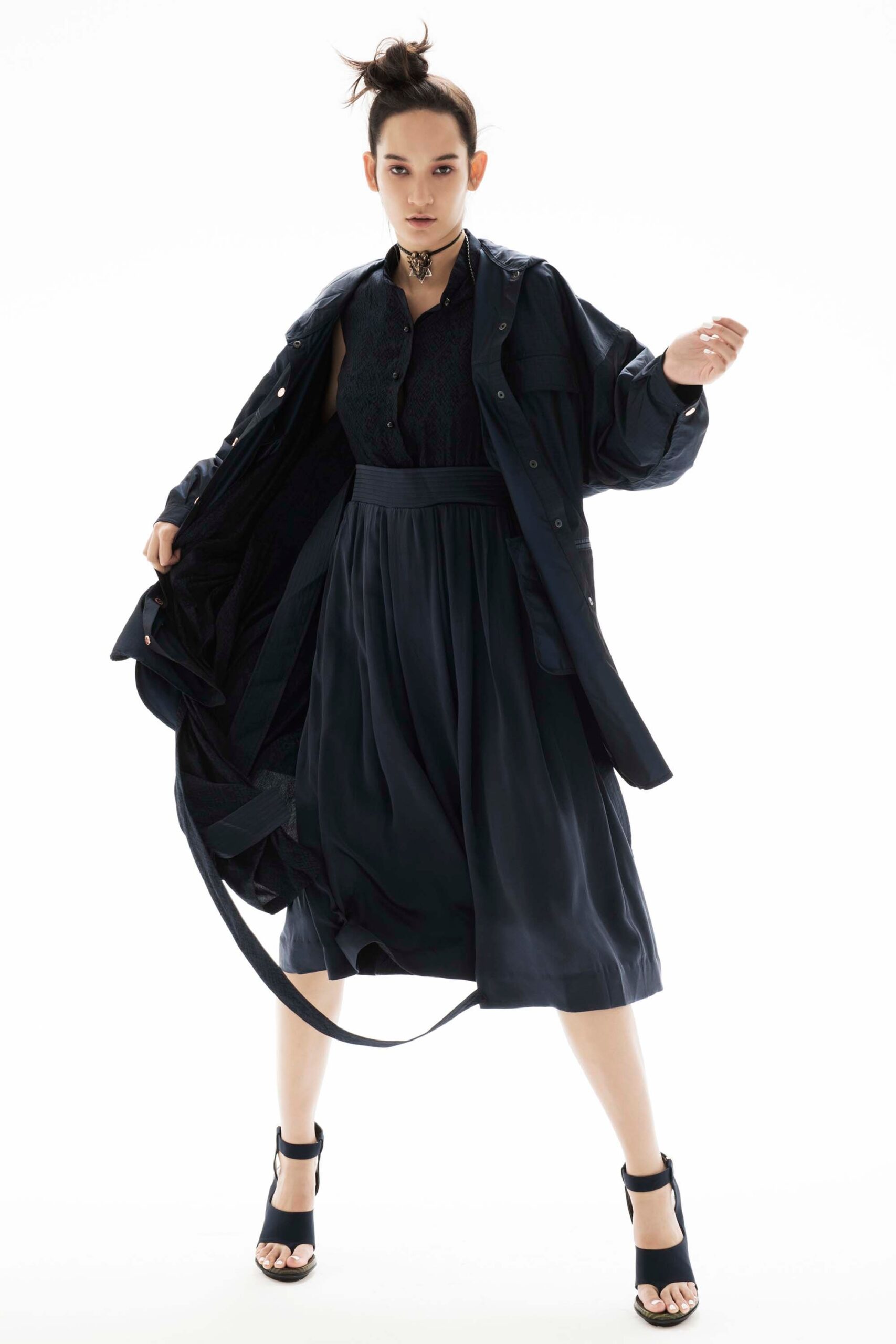 black midi dress and oversized coat