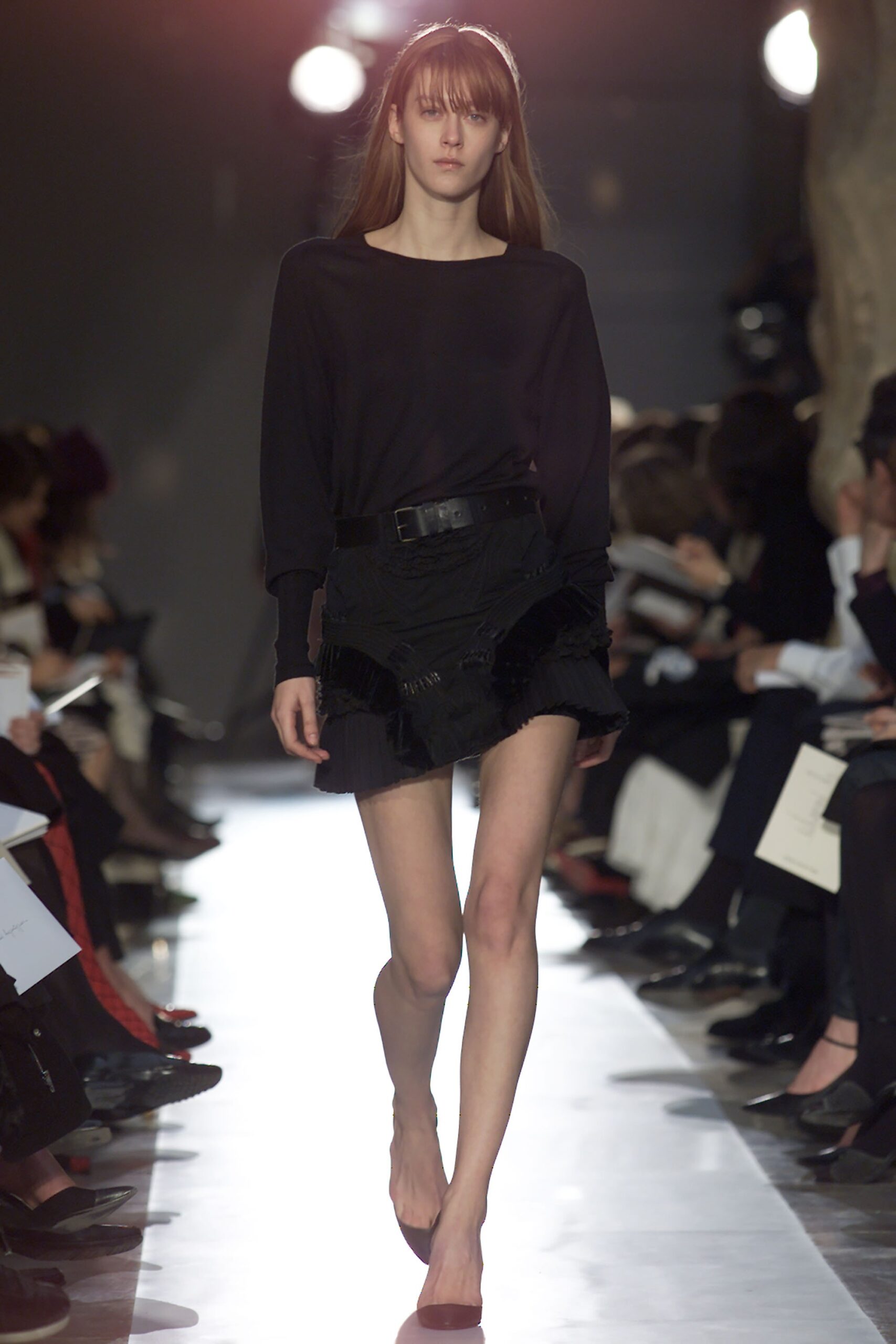 black denim fitted high-waisted fringed mini skirt