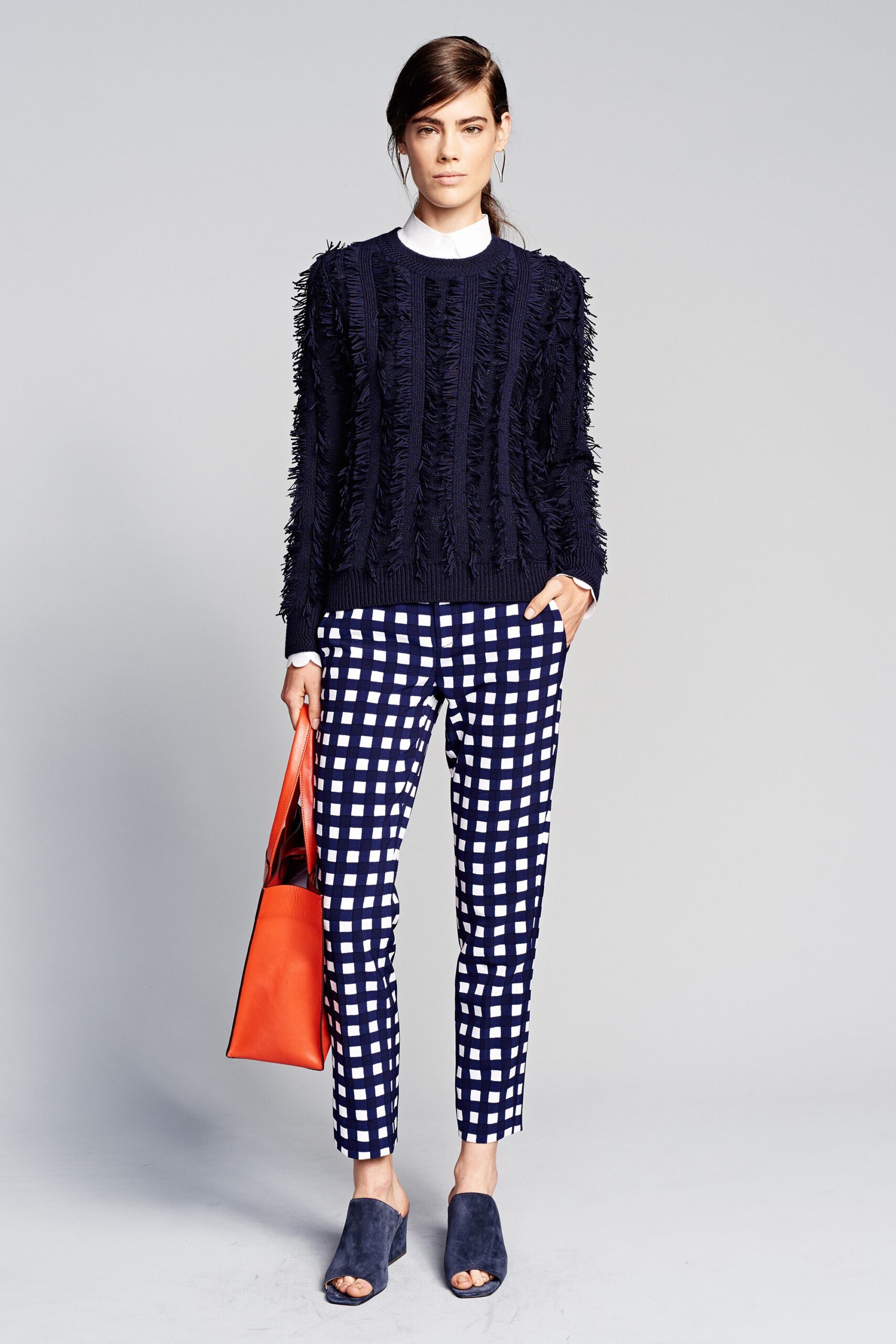 navy fringed sweater with checked pants