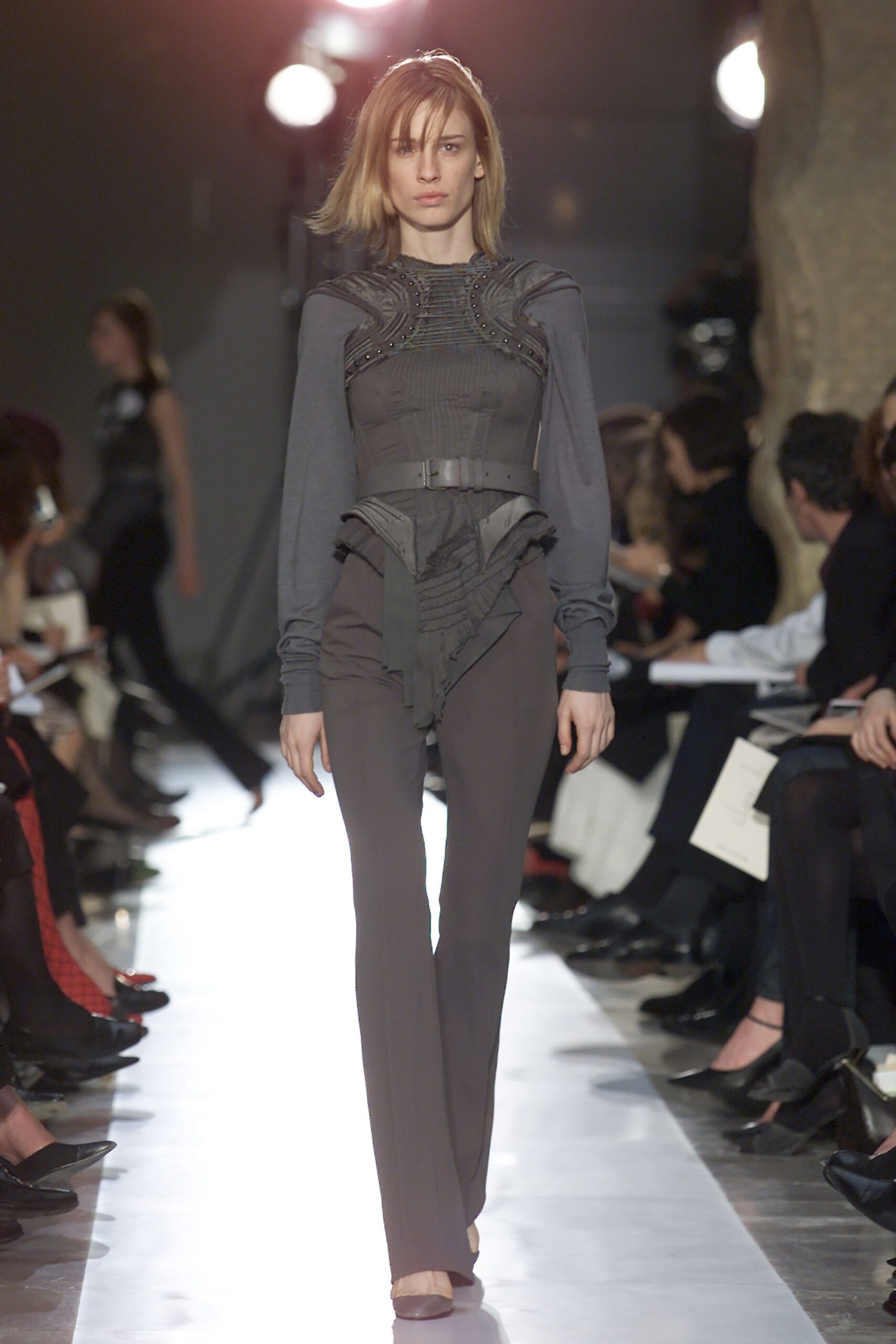 gray fitted top with brown pants