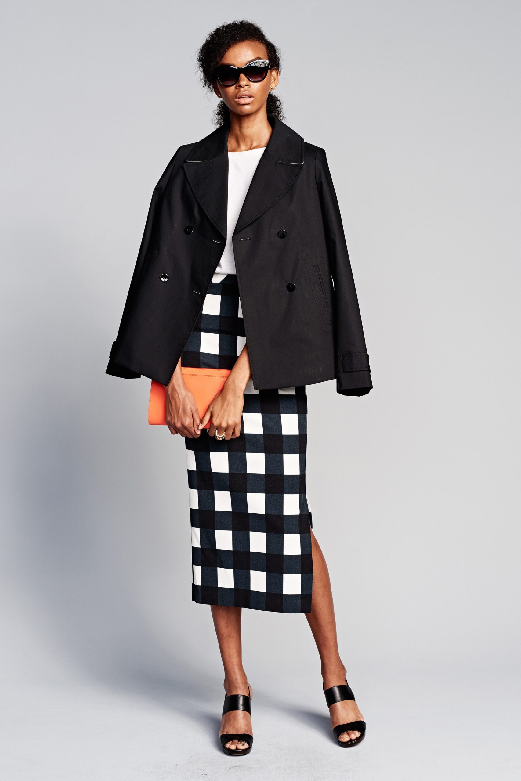black jacket and checkered skirt