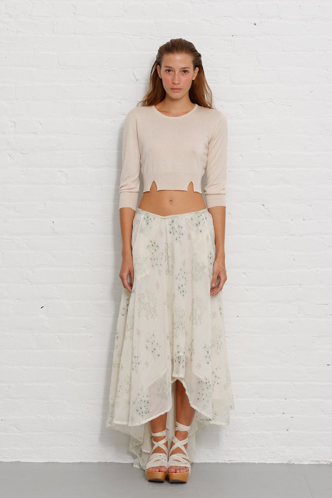 beige cropped top with white asymmetric skirt