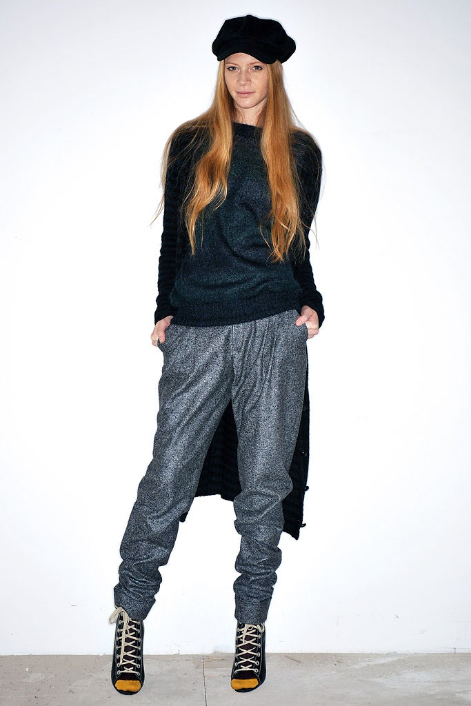 black wool relaxed sweater with gray pants
