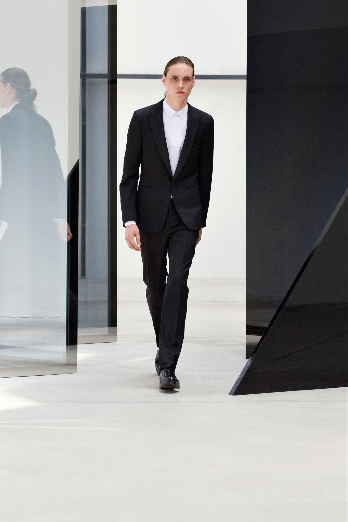 black tailored suit with white shirt