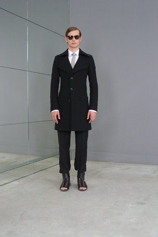 black wool coat and tailored pants