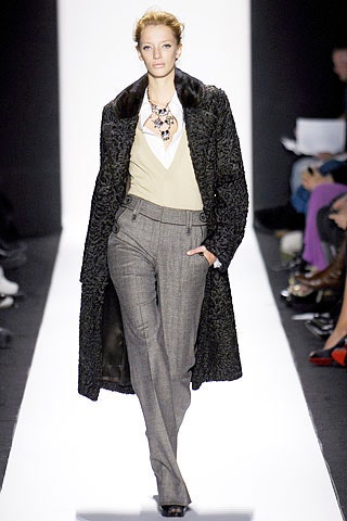 black fur coat with gray pants
