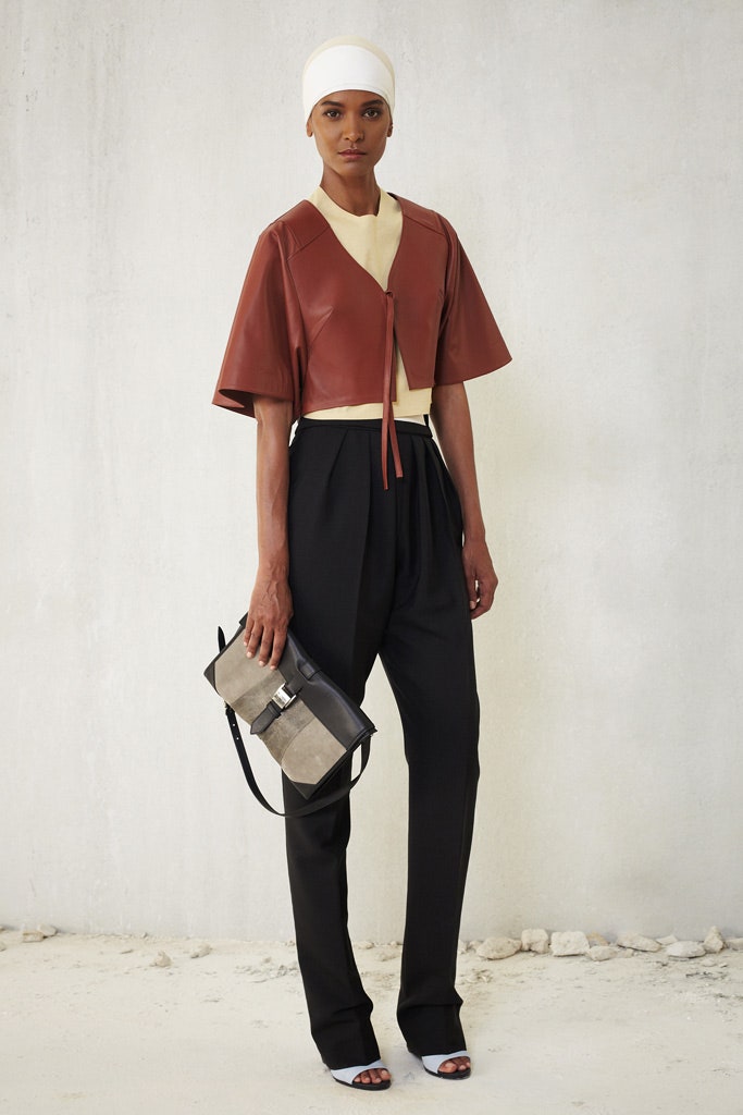 brown leather fitted top with tailored pants