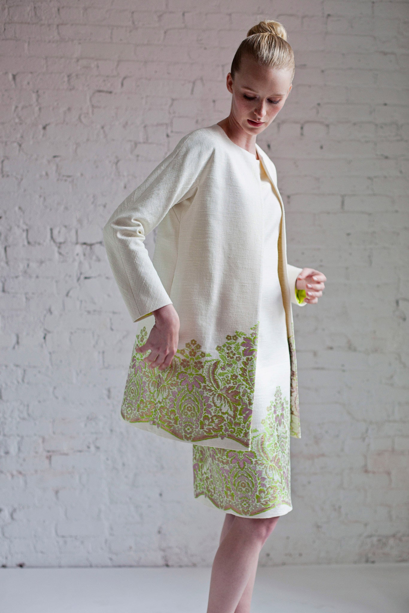 white embroidered coat and skirt