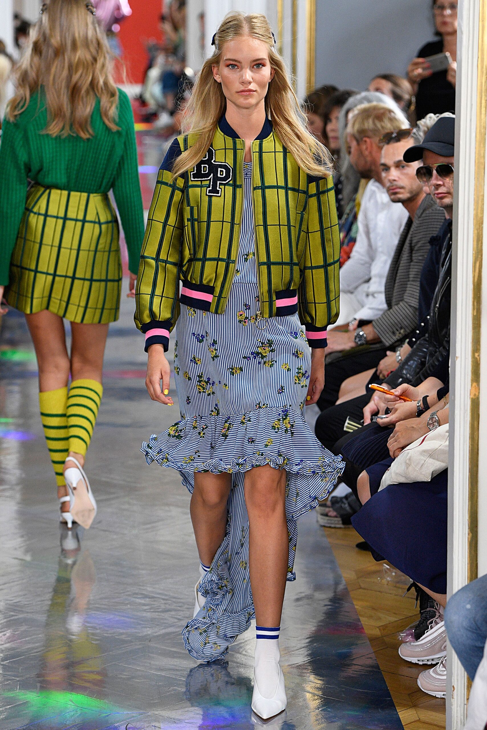 green checked jacket and blue floral dress