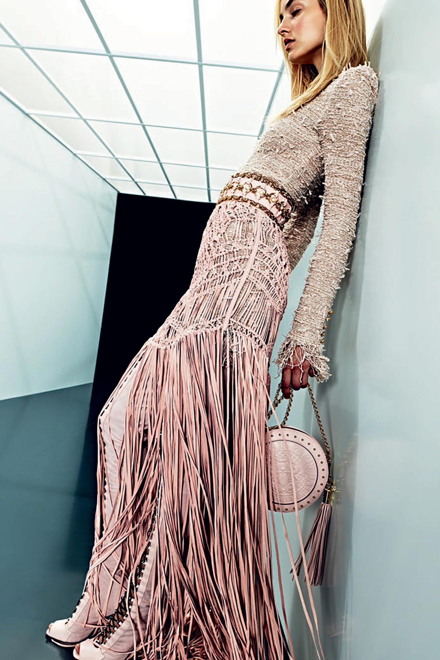 beige top with fringed pink skirt