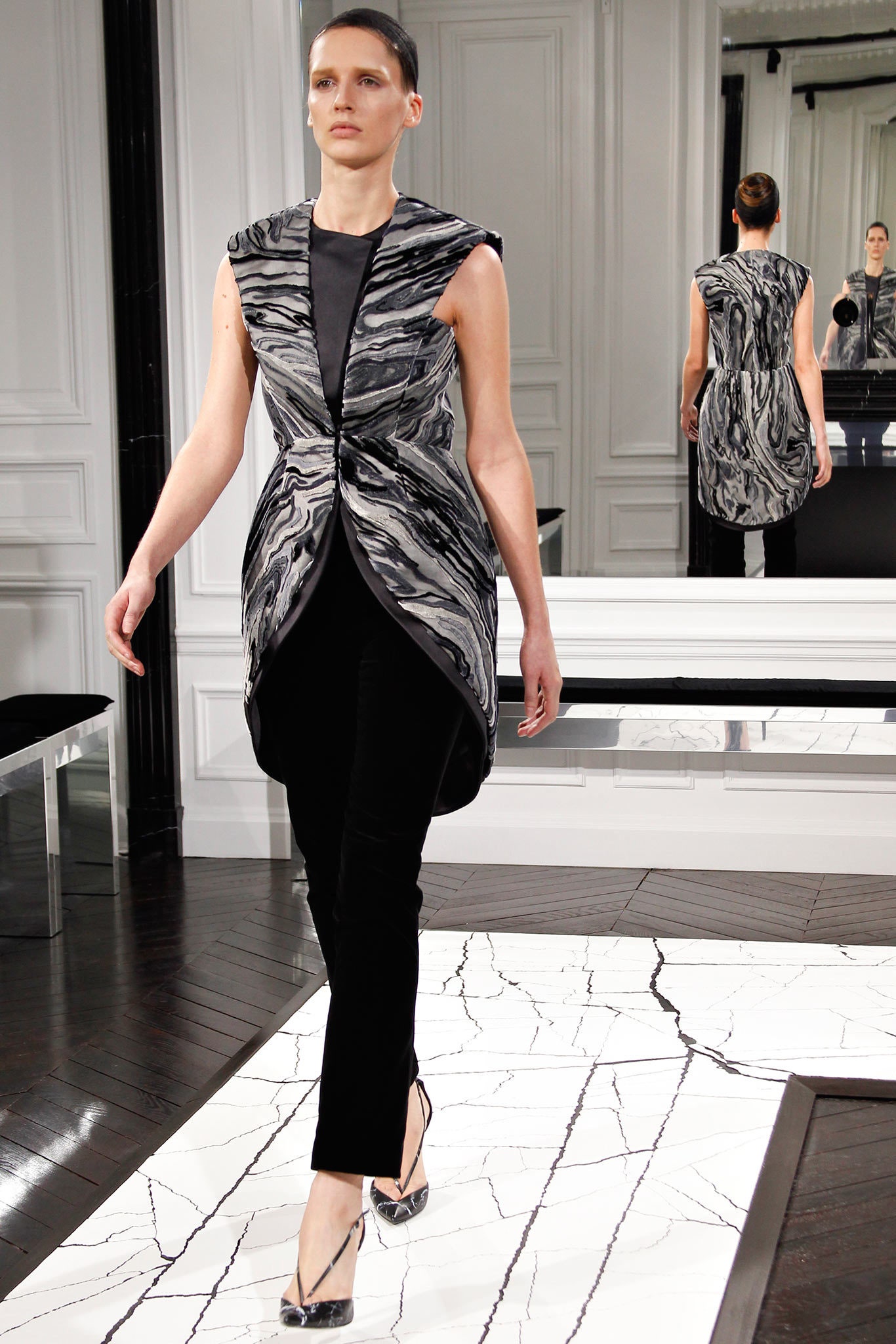 black and gray fitted top with slim pants