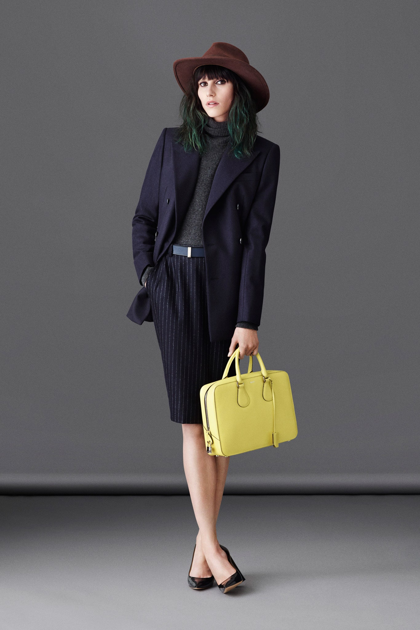black tailored blazer with gray turtleneck