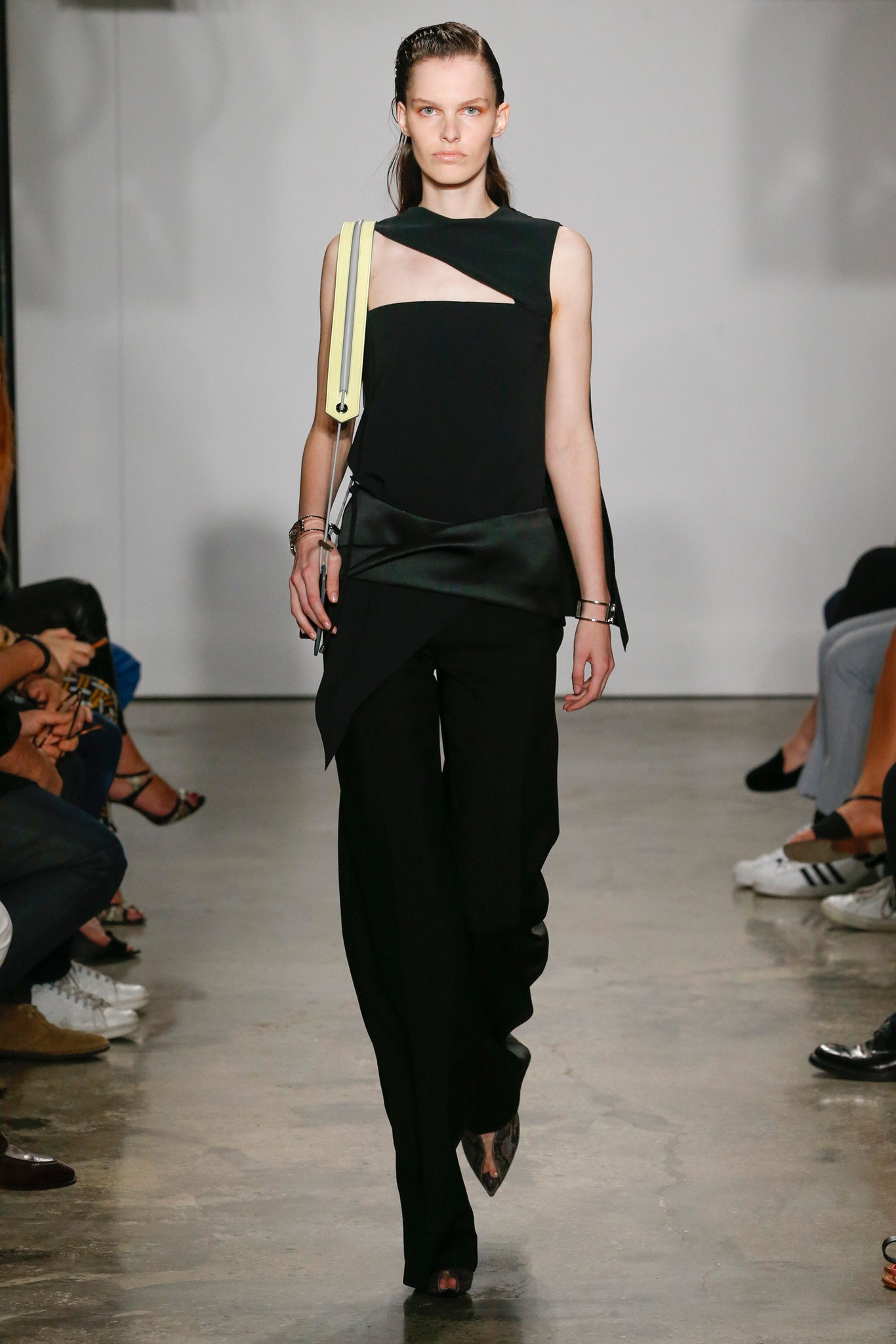 black fitted top and tailored pants