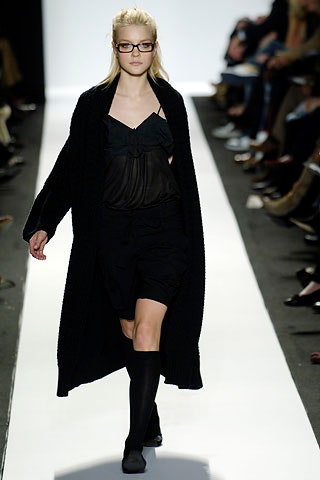 black wool coat and silk dress