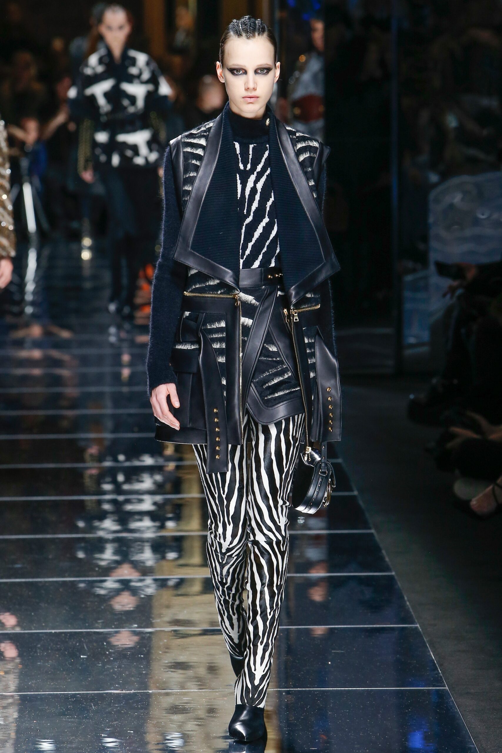 black leather long-sleeve collared fitted zippered layered jacket