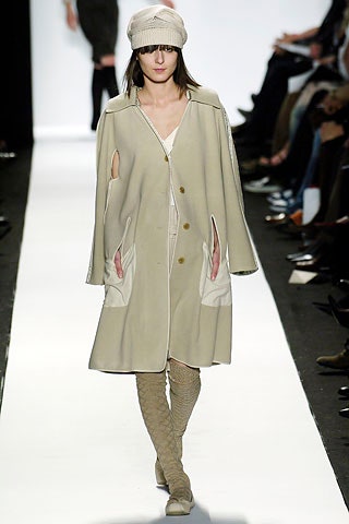 beige wool cape with white top