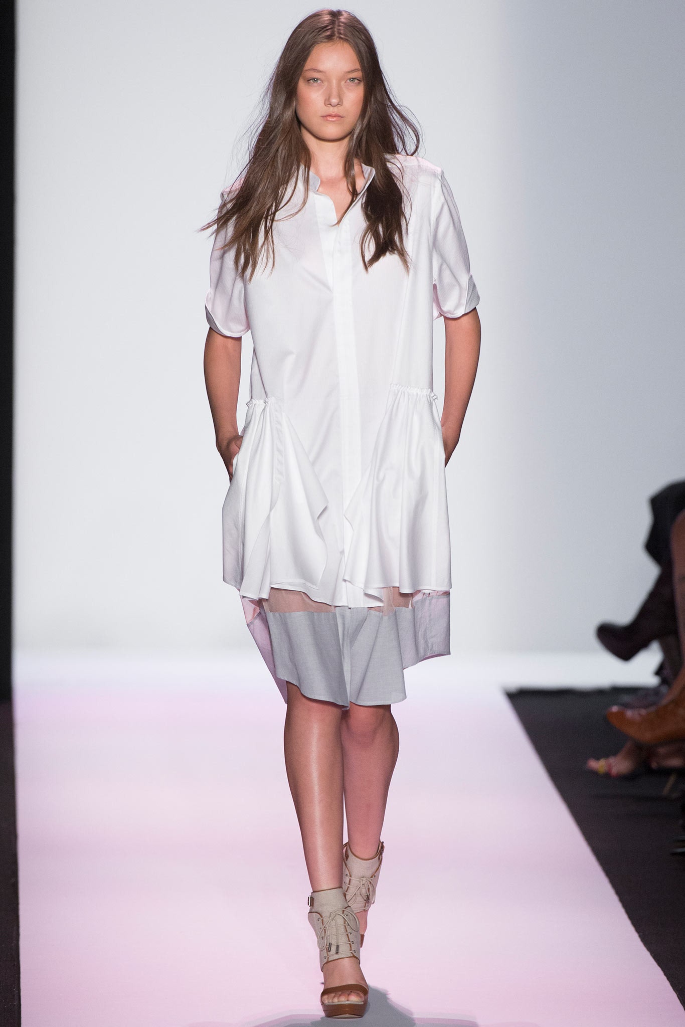 white shirt-dress with gray shorts