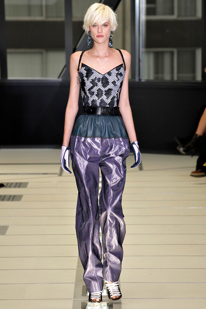 fitted black silk top with wide-leg pants